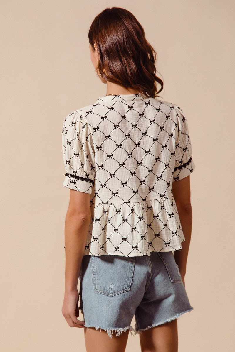 BOW RIBBON PRINTED COTTON GAUZE PEPLUM TOP WITH TRIM image 1