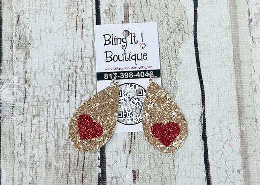 Gold glitter heart earrings image 0