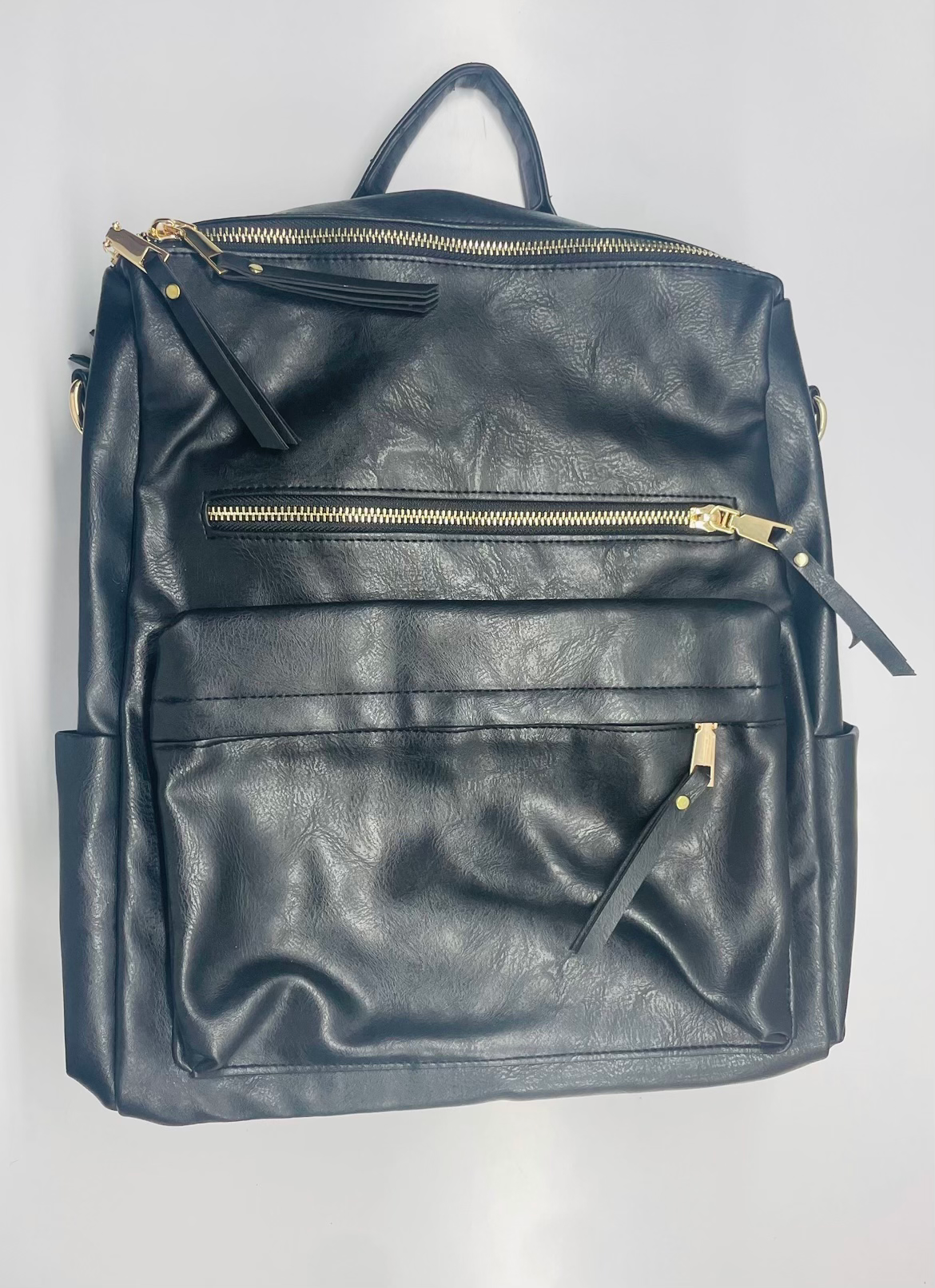 Leather Layer Backpacks image 1