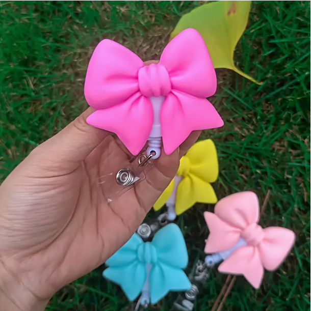 BOW BADGE REEL image 0